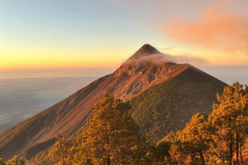The Volcano Fuego, seen from the Acatenango Volcano by sunrise