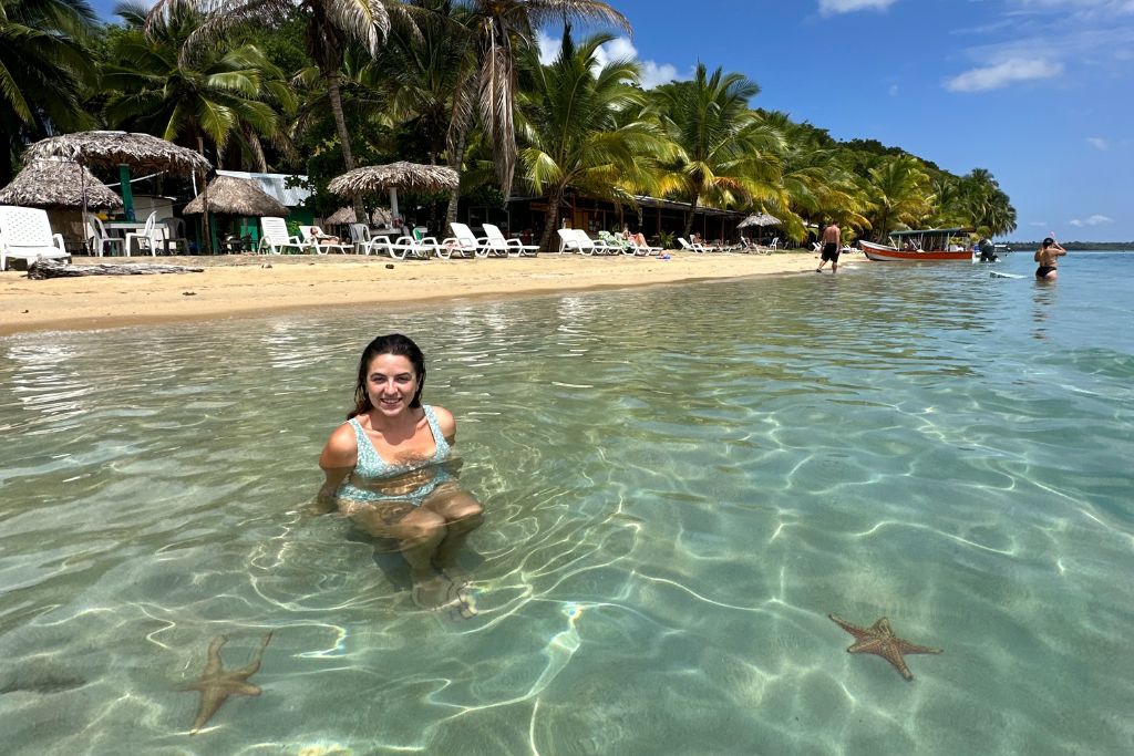crystal clear water with visible starfish, at starfish beach in Panama