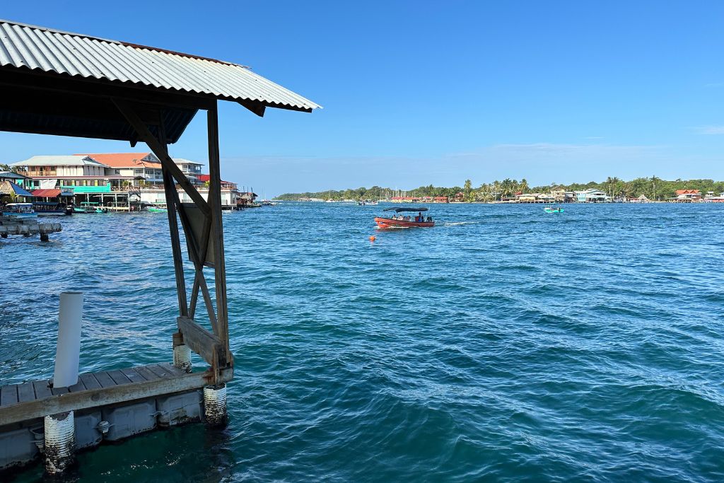 a taxi boat coming into Colon Island
